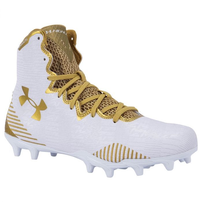 white and gold cleats